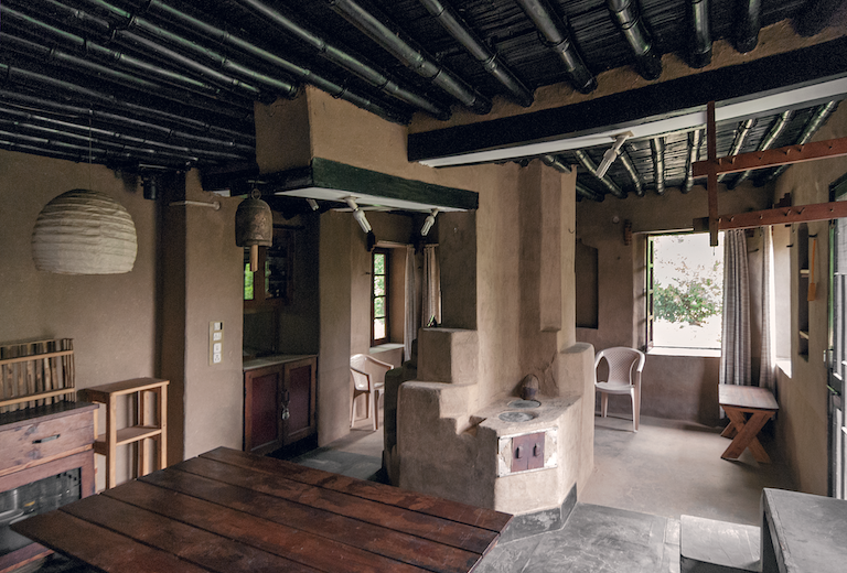 Adapted mud house at Kangra. Didi Contractor’s revival of the traditional Kangra houses made of mud, bamboo, wood and stone – adapted to the scale of modern houses – has become a movement in Kangra, Himachal Pradesh. One such house made by her.