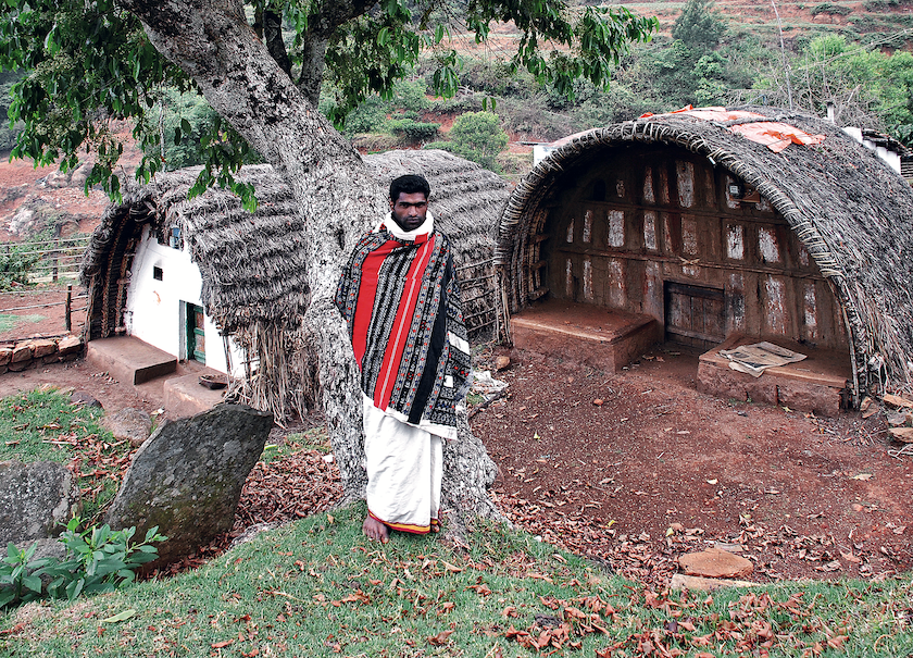 Houses of the Toda community in the Nilgiri mountains, Tamil Nadu These are vaulted huts made of bent bamboo and grass with a low entrance. The hut on the right is a Toda temple.